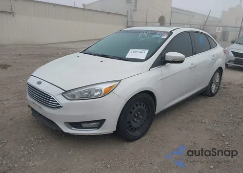 2018 Ford Focus Titanium from USA, damaged, VIN 1FADP3J24JL271812